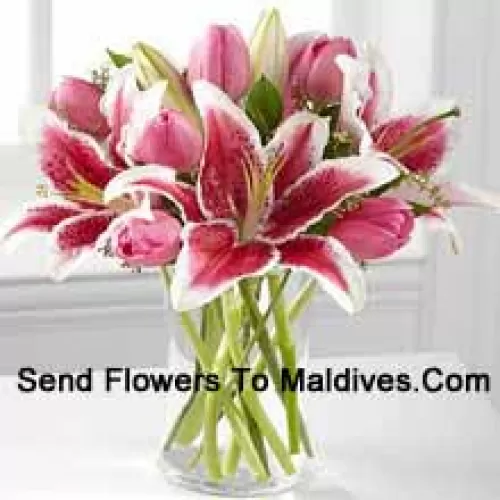 Pink Lilies And Pink Tulips In A Glass Vase