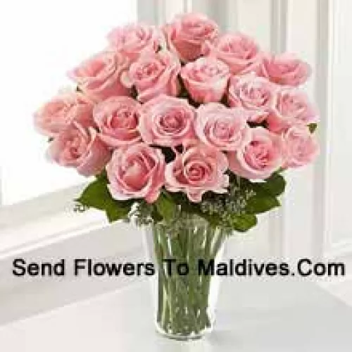 18 Pink Roses With Some Ferns In A Vase