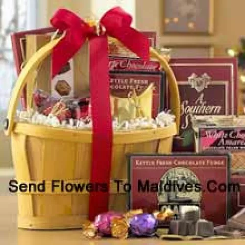 A classic combination of the finest gourmet chocolates make this a gift basket perfect for anybody that loves sweets. Includes Italian Chocolate Truffles, crunchy Almond Roca, a White Chocolate Amaretto Wafers, Chocolate Fudge, creamy rich Milk Chocolate, Belgian Chocolates, and assorted individually-wrapped Godiva Chocolates. We pack it all in a reusable handle basket and ship your gift straight to your recipients. (Please Note That We Reserve The Right To Substitute Any Product With A Suitable Product Of Equal Value In Case Of Non-Availability Of A Certain Product)