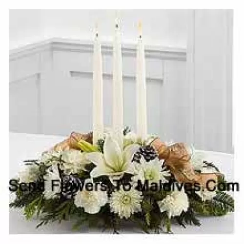 Celebrates the holiday season with winter grace and style. White Asiatic lilies, carnations and chrysanthemums create an exquisite display accented with holiday greens, snow-tipped pinecones and sheer copper ribbon. Surrounding three white taper candles, this holiday centerpiece will add light and love to their seasonal celebration. (Please Note That We Reserve The Right To Substitute Any Product With A Suitable Product Of Equal Value In Case Of Non-Availability Of A Certain Product)